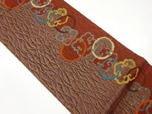 すくい織丸文に抽象模様織出し袋帯